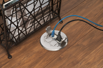 A combination floor box kit with installed low voltage devider. Includes four flip lids and gasket, One low voltage device and one 110v receptacle. Round Nickel Plated Cover.