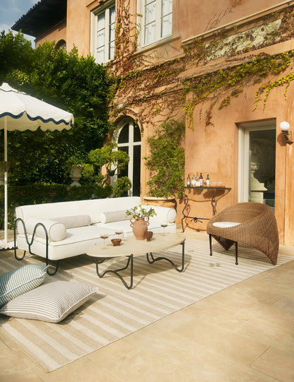 Open Box: Peggy Outdoor Oval Coffee Table, Faux Travertine by Sarah Sherman Samuel