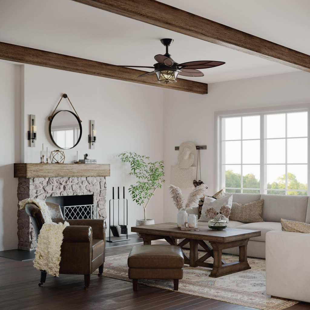 Architectural bronze-finished ceiling fan with a clear seeded glass shade.
