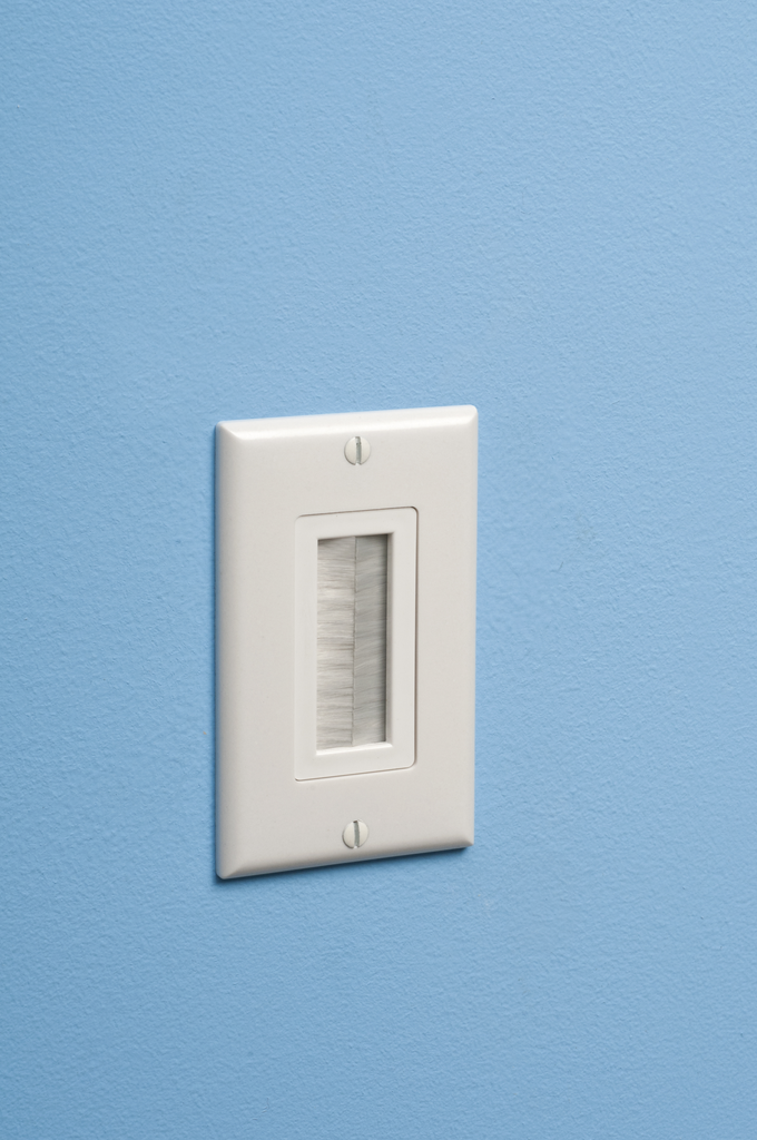 Cable entry device with brush style cover. White Non-metallic. Includes two #6 screws.