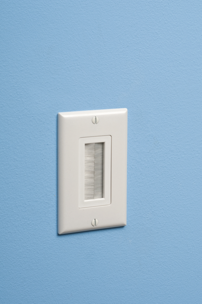 Cable entry device with brush style cover. White Non-metallic. Includes two #6 screws.